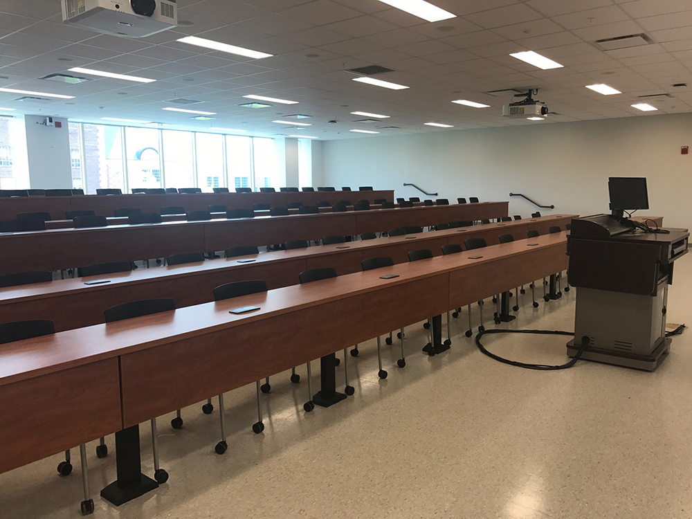 Rendering of Everitt classroom; group tables with whiteboard walls