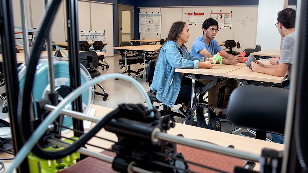 Rendering of Everitt classroom; group tables with whiteboard walls